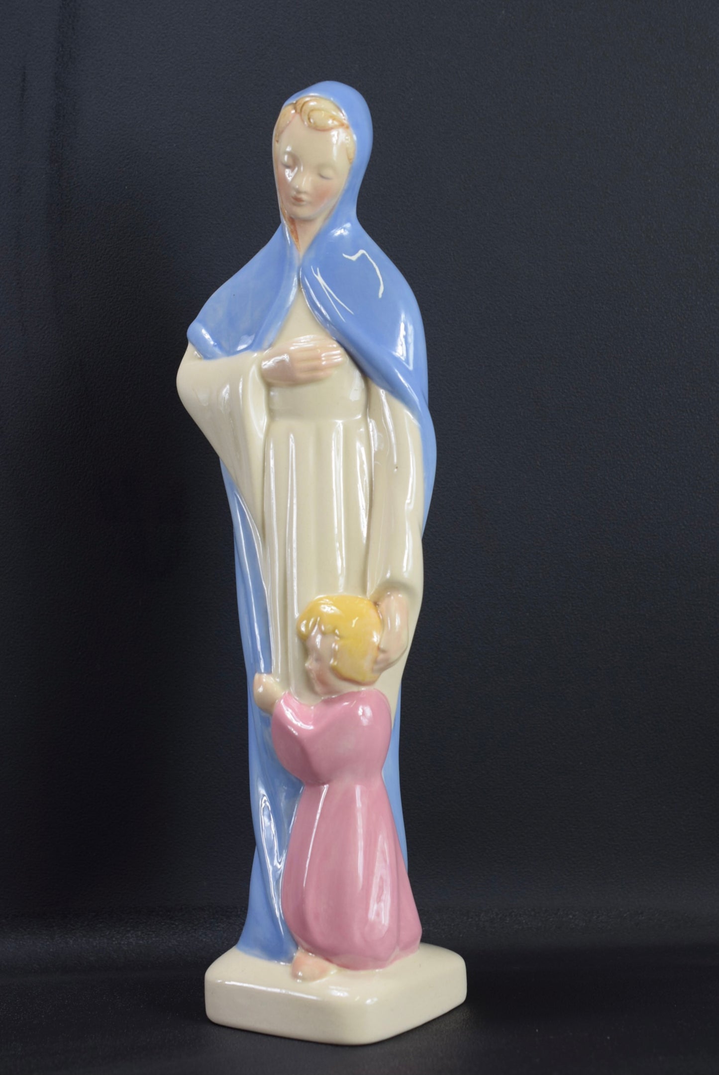 Virgin Mary and Praying Child Statue