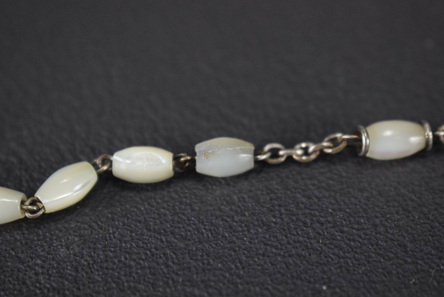 Vadrouille et chapelet en argent