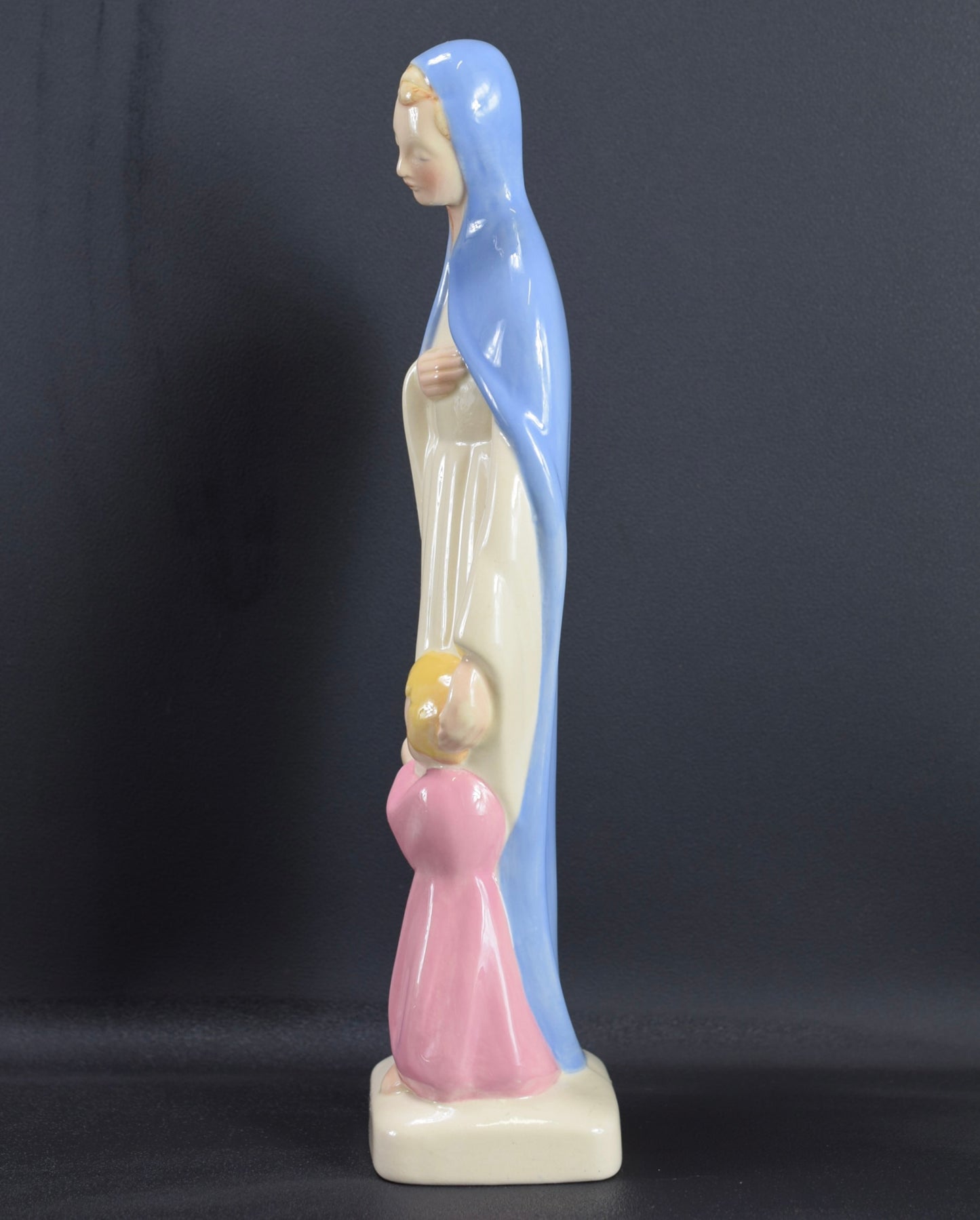 Virgin Mary and Praying Child Statue