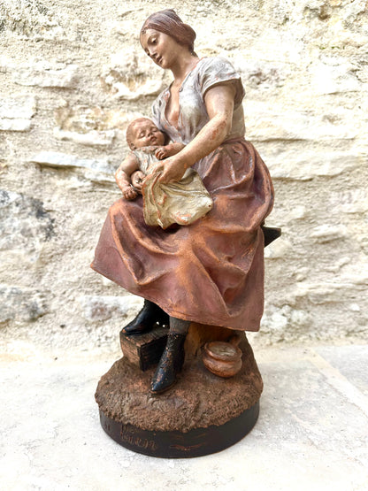 Motherhood Terracotta Sculpture by LE GULUCHE and HANNE