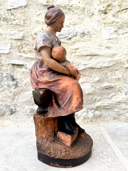 Motherhood Terracotta Sculpture by LE GULUCHE and HANNE