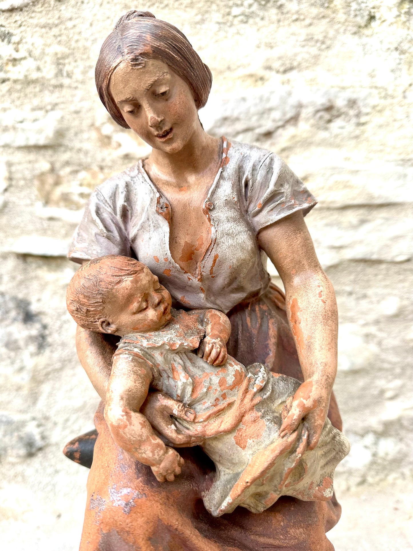 Motherhood Terracotta Sculpture by LE GULUCHE and HANNE