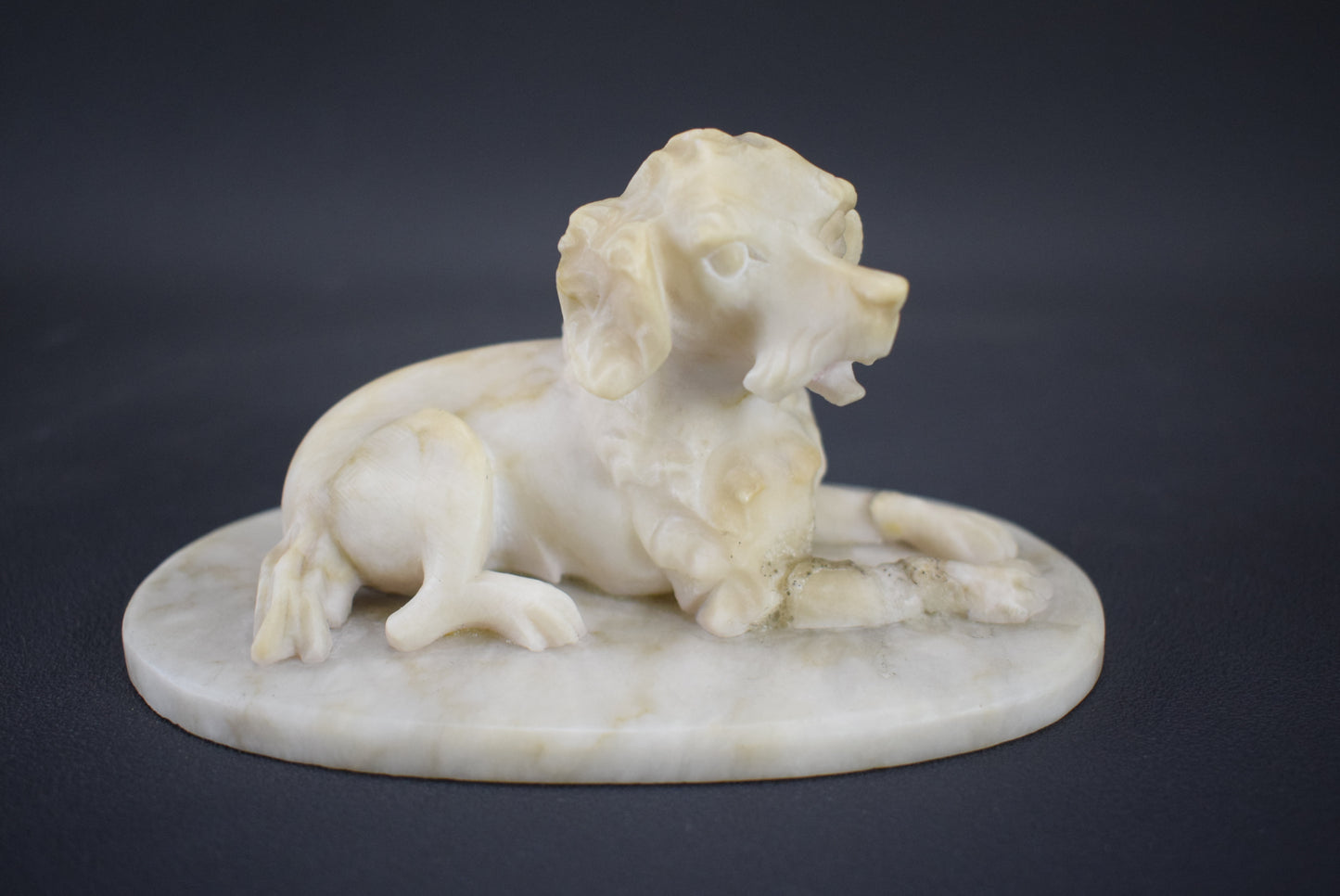 Carved Alabaster Dogs - Charmantiques